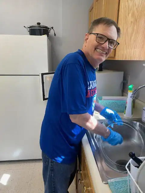 Client cleaning dishes